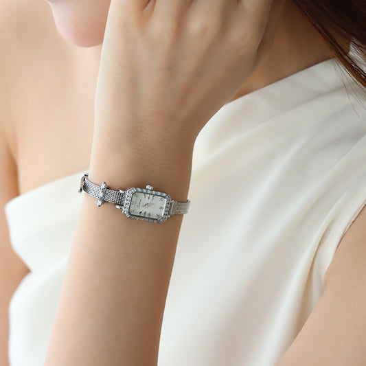 Sotoiru rectangular watch worn on wrist with elegant strap design