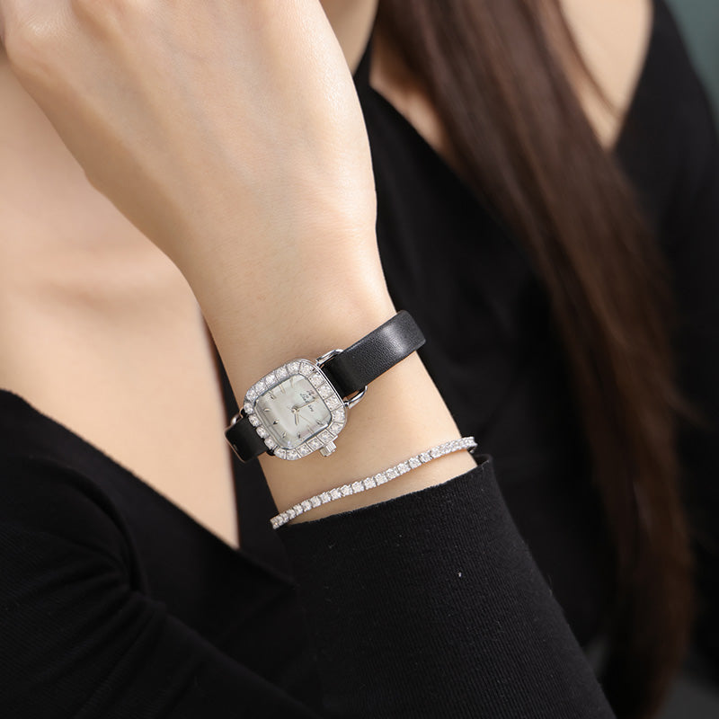 Sotoiru women's watch worn on wrist with elegant rectangular case