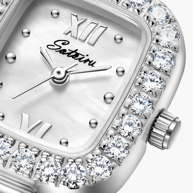 Close-up of Sotoiru mother-of-pearl dial with zircon details