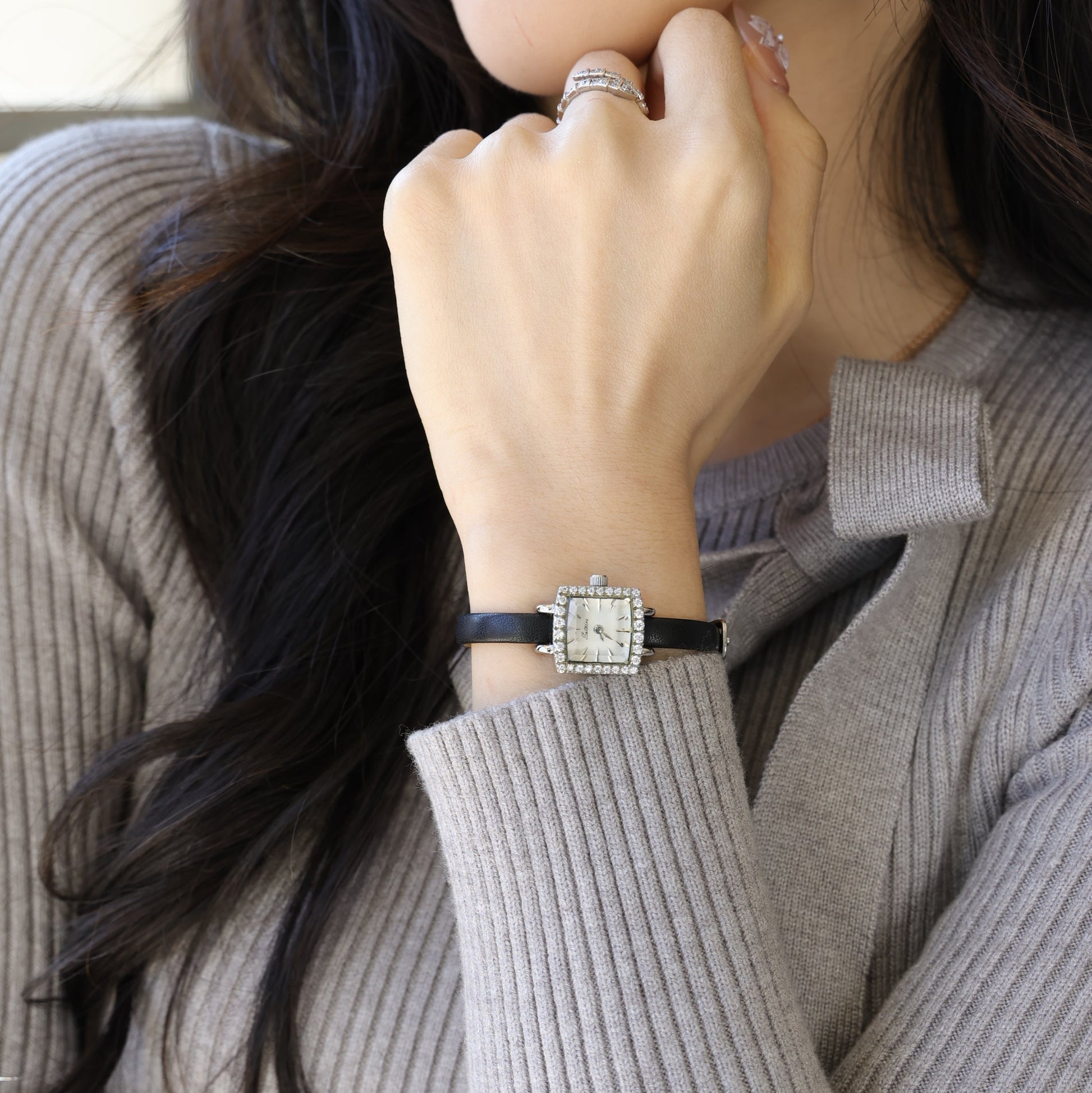Sotoiru square watch worn on wrist with interchangeable strap design