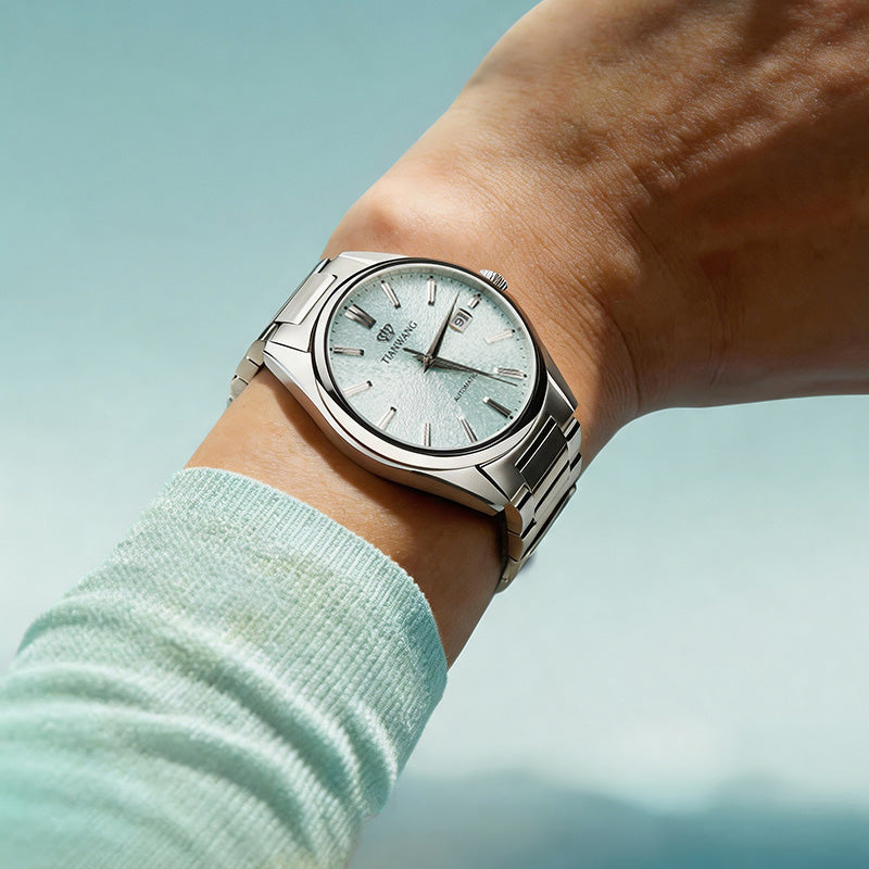 Tianwang automatic watch worn on wrist featuring Misty Valley Green dial